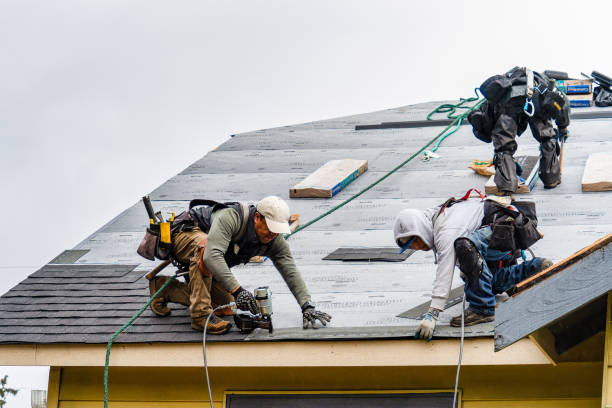 Professional Gutter Installation technician working in Hampton, CT